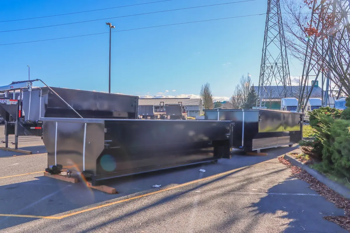Roll-off dumpster ready for waste disposal at job site for 12 Yard Dumpster Rental in Warner Robins